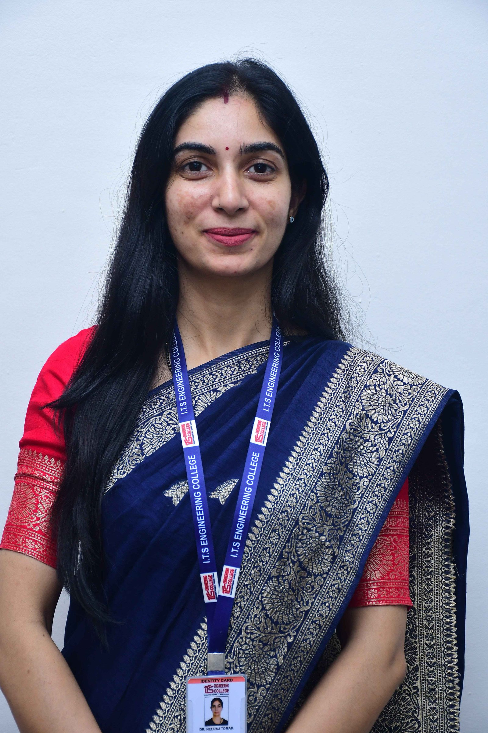 Dr. Neeraj Tomar